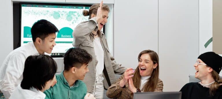 Image of happy people smiling and laughing - energising HR career