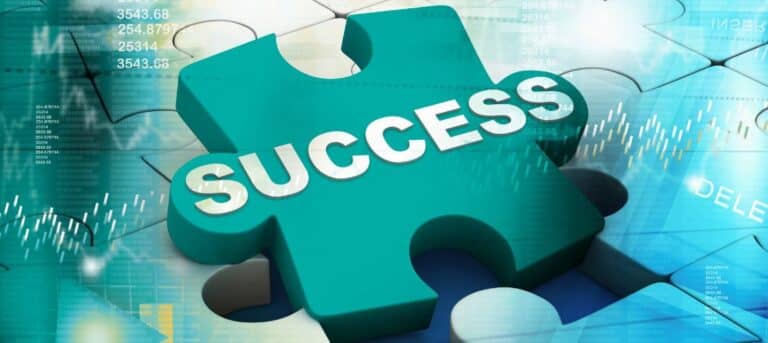 Image of a large jigsaw piece with success written on it - redefining career success in HR
