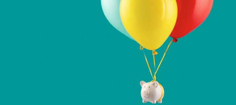 Picture of a piggy bank being lifted by three balloons - managing money as an HR consultant
