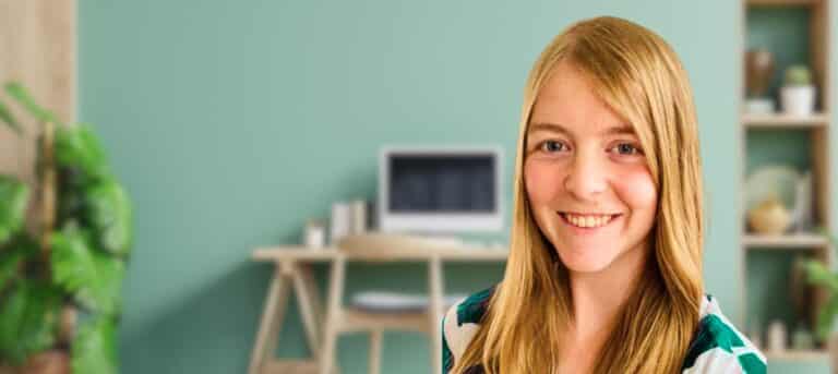 Head and shoulders photo of Amy Merrell on a blurred background - outsourced support in Salisbury