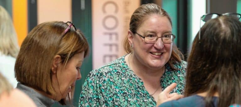 Image of women talking - HR franchise training and support