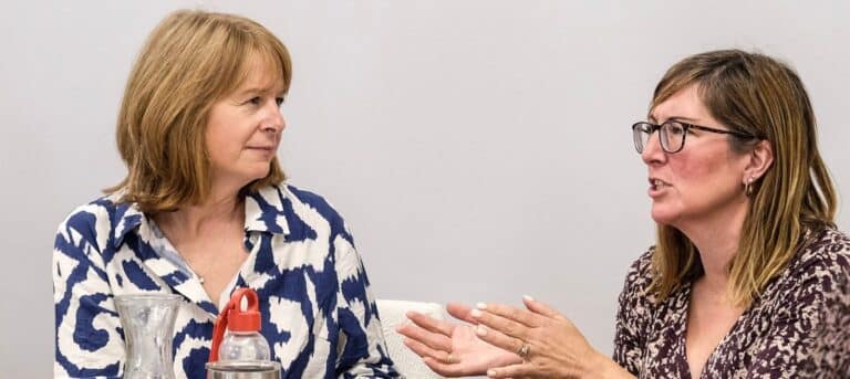 Image of two ladies talking - handling tricky HR conversations