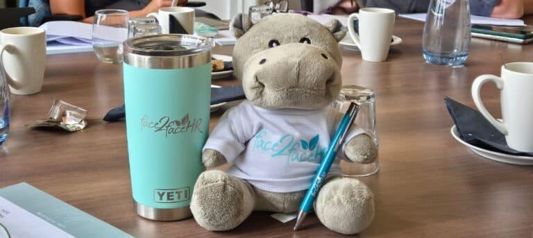 Image for a soft toy wearing face2faceHR t-short holding pen - hr consultancy support for SMEs