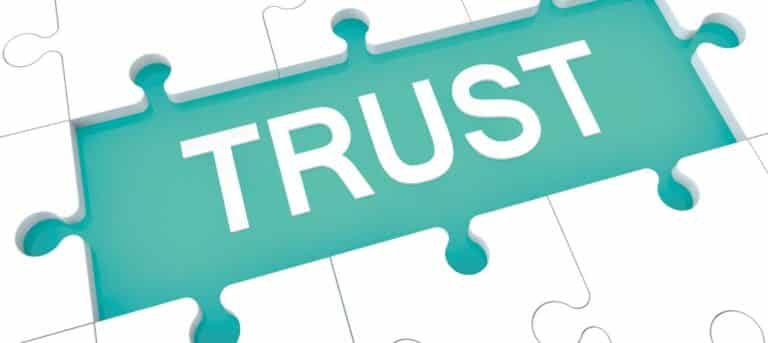 Image of a large jigsaw piece with the word trust suggesting trusted SME HR adviser