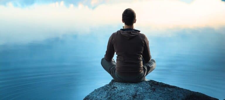 Picture of a person looking out to sea contemplating - HR career change