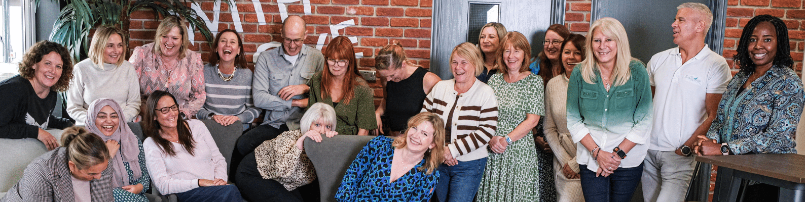face2faceHR team photo with everyone laughing - hr franchise opportunity